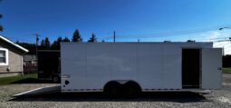 2027 HAULMARK TRANSPORT PREMIUM 8.5′ x 24′ ENCLOSED CAR TRAILER-12,000 GVW, V-NOSE, 16″ WHEELS, ESCAPE DOOR, BOGEY WHEELS, STABILIZER JACKS, ELECTRIC BRAKES AND REAR RAMP DOOR (TSV8524T4)-WHITE