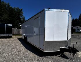 2027 HAULMARK TRANSPORT PREMIUM 8.5′ x 24′ ENCLOSED CAR TRAILER-12,000 GVW, V-NOSE, 16″ WHEELS, ESCAPE DOOR, BOGEY WHEELS, STABILIZER JACKS, ELECTRIC BRAKES AND REAR RAMP DOOR (TSV8524T4)-WHITE